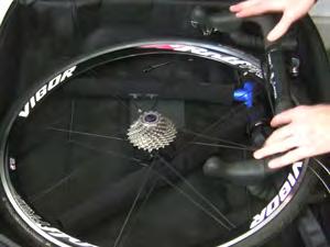 You may find that your wheel fits better with the cogs facing down rather than up,