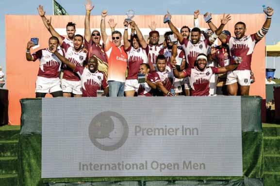GULF TIMES QATAR CHAMPIONS The Qatar rugby team pose after winning the International Open title in the Emirates Airline Dubai 7s tournament in Dubai yesterday.