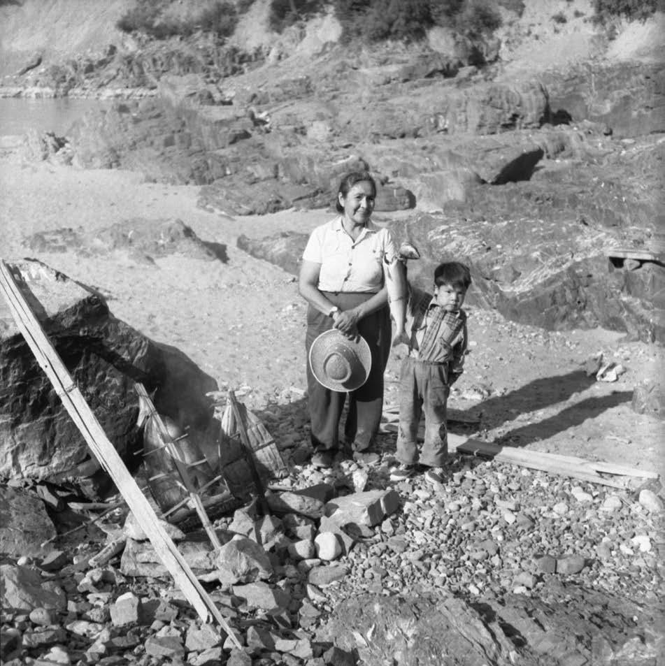 Fig. 3.3 Arnie Narcisse with Grandmother. West bank of the Fraser River, immediately south of the Bridge River confluence, ca. 1959. Photo Malcolm Parry.