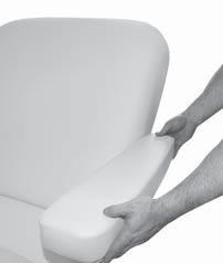 Holding securely, rotate the arm rest while at the same time pulling slightly away from the