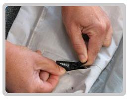 Removing Bladder Undo the LE access zip; make sure that the zip is clean and free from sand before proceeding.