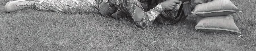 (2) For the basic prone supported firing position (Figure 4-23), spread the legs apart, with the inside of the feet flat on the ground.