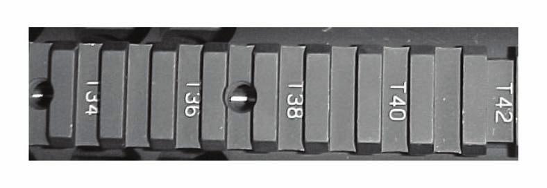 Chapter 2 2-20. ARS rail covers can be quickly attached and detached from the ARS. A spring latch at one end of each rail cover automatically engages cutouts at the end of each rail.