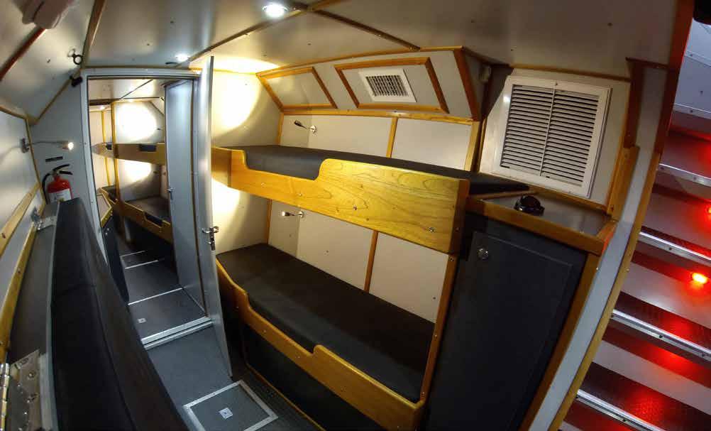 Crew Accommodations: Below-decks, the twin hulls provide berthing for a crew of up to twelve, with an enclosed head.