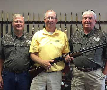NATIONAL WILD TURKEY FEDERATION GUN OF THE YEAR R E C I P I E N T Alabama National Wild Turkey Federation (NWTF) State Chapter President Craig Scruggs and board member Mike Colquett are pictured
