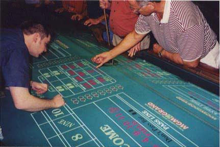 numbers, either through come or place bets, he sets up a game within a game where he can win on many different numbers and not just the shooter's point.