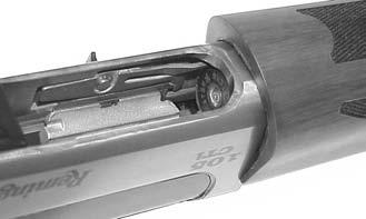 5. Push up to four (4) shells of the correct gauge and length one at a time fully forward into the magazine tube.