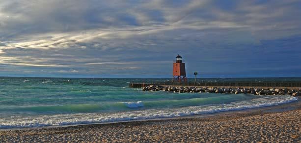 N Photo by Visit Charlevoix LAKE MICHIGAN BEACH 95 GRANT STREET, CHARLEVOIX, MI 49720 One of Charlevoix s most frequented and favorite spots, Lake Michigan Beach is