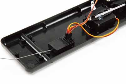Attach servo arm extension with the main sheet line to the sail control servo.