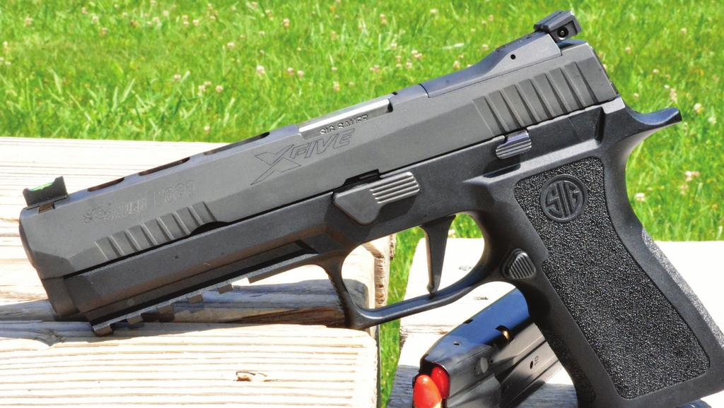 ///// SIG SAUER P320 X5 SOMETHING VERY NEW SIG SAUER P320 X5 BY ARON BRIGHT, A51967 ake Martens set up the deal to review the SIG SAUER P320 X-5 and then it was a matter of getting the gun in hand.