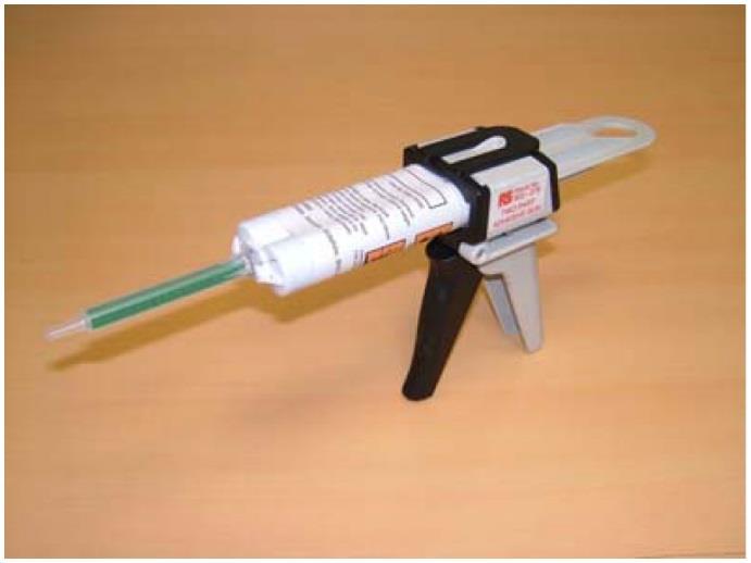 S1125 Single Dual Syringe with Applicator Gun Push up lever, slide in double-barrelled piston with ratchet side downwards.