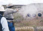 Smoke and flame scorched the air on Friday when side matches provided long range rifle and pistol, speed, cowboy clays, and the OK Corral and Jack Rabbit team events until late afternoon, when dark