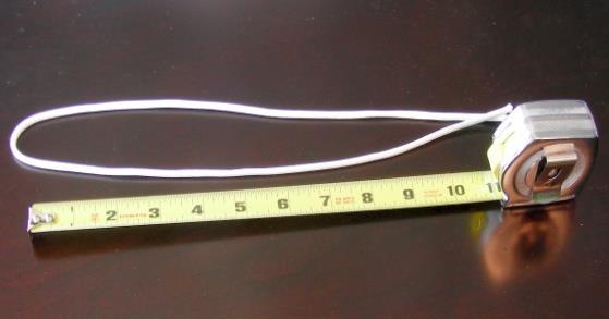 Scissors Step 2 Take a piece of white paracord and measure off about 22 inches. Fold the piece around, forming a loop.