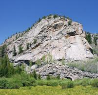 Twenty-four miles southeast of Pinedale, Wyoming, tucked just inside of the Wilderness Boundary lies a 00-foot buttress of bombproof Wind River granite.