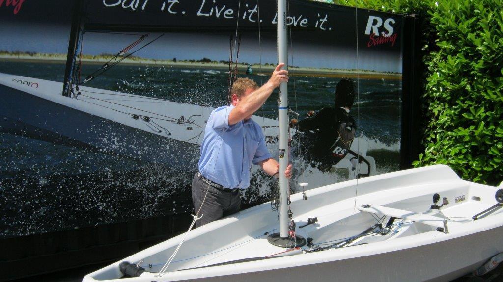 You will need two people to step the mast as one will need to hold the mast upright while the other connects the Shrouds and Forestay. Stepping the Mast 1.