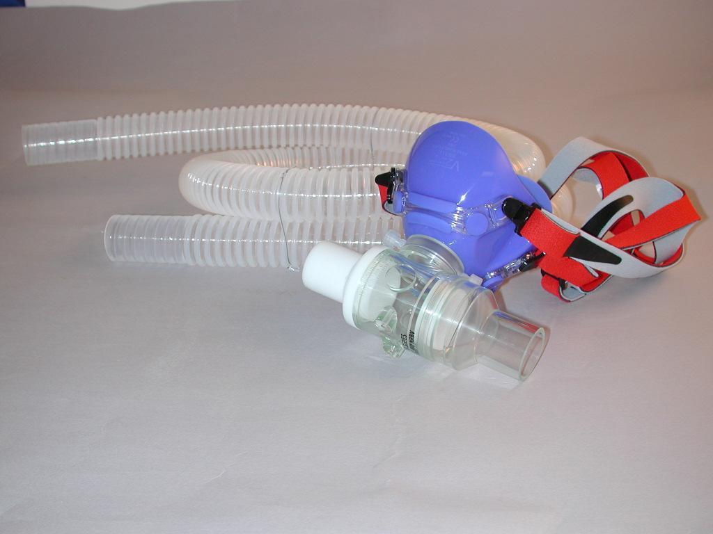 Figure HE-4-S5: Mask, non-rebreathing valve, and smooth interior tubing. 8. On the iwire-ga, place one filter on the Room Air port, place a second filter on the Sample In port.