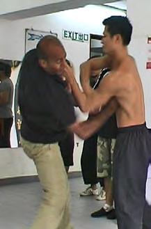 This was the result of the opponent stupidly throwing a deliberate Biu Tze to Master Phillips eyes. To Spit is to strike or dispel the opponent away from you.