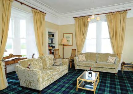 Downstairs includes a comfortable sitting room with an open peat fire, a large dining room, a second sitting room, a laundry room and a well equipped kitchen.