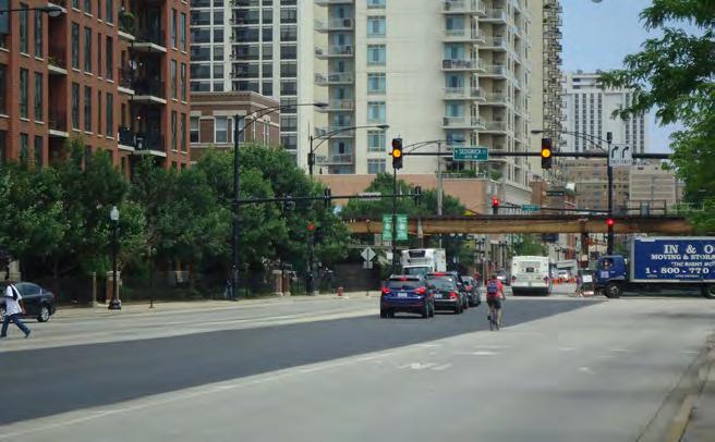 The Clybourn Avenue barrier-protected bike lane includes curb separation and connects people riding bikes to the CTA Red Line, multiple Divvy stations, and the dense neighborhoods of Lincoln Park and
