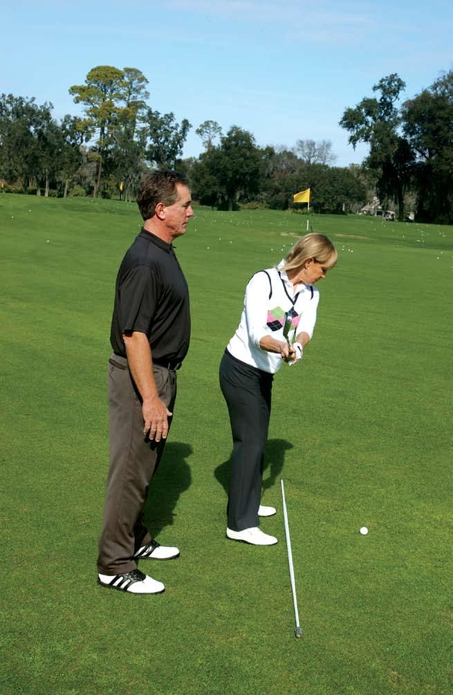 INSTRUCTION ONE-PLANE SWING with your lead hand (right hand for a right-handed golfer), pull the cord.