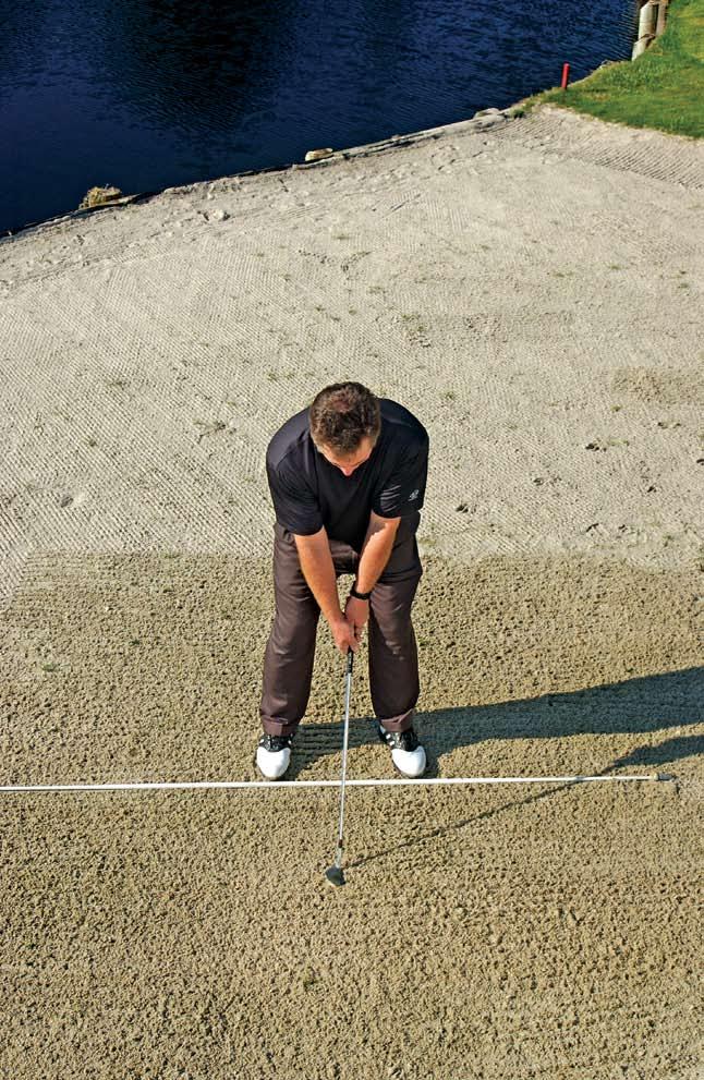 INSTRUCTION ONE-PLANE SWING One-Plane Sand Trap Drill To better understand the difference in the downswing between one- and two-plane swings, set up in a sand trap with your 9-iron as though you re