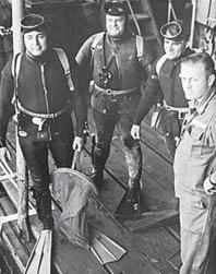 (One Navy Diver s Excellent Adventure...continued from page 11.) (L-R): QMC Bob Barth, HMC Glen Iley, SWC Howard Buckner and LT Dan Smith prepare for a dive during SEALAB II.