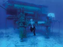 In the late 1950 s and early 1960 s Captain George Bond used Navy Divers in the GENESIS laboratory experiments, which set out to prove saturation diving was possible and could dramatically improve
