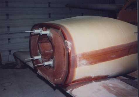 The corner is rounded and layers of fiberglass cloth are used to