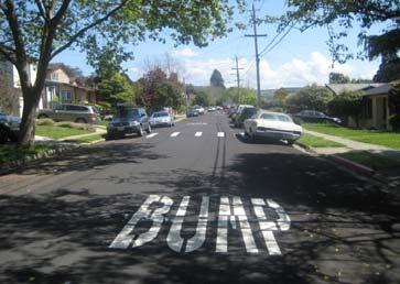 Speed humps cannot be placed within roadway curves due to sight distance issues and they cannot be installed within 200 feet of an intersection.
