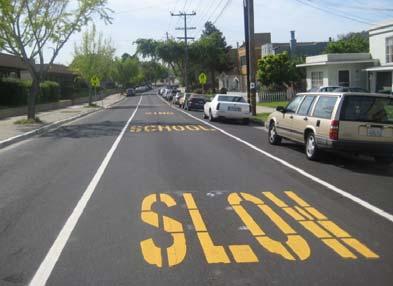 Narrower lanes may give drivers the impression of a narrower street with less room for maneuvering, thereby potentially