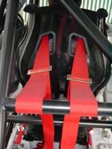 This improper installation may allow webbing to slide through the hardware during an accident.