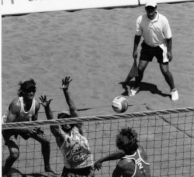 GAME CHARACTERISTICS Beach Volleyball is a sport played by two teams of two players each on a sand court divided by a net.
