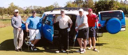 participants with the Toyota FJ Cruiser at the Hole-In-One competition.