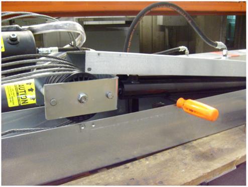 example, a large screwdriver was used to hold the assembly up out of the auto-belay box.