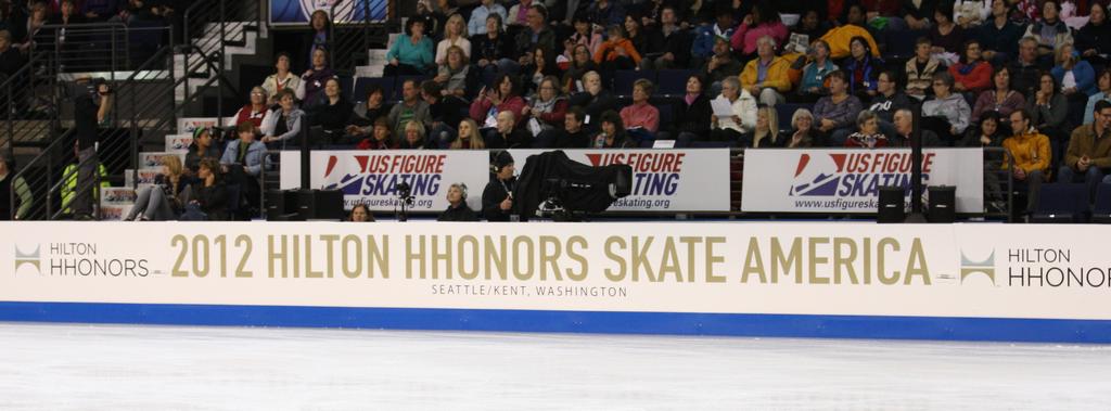 COMPETITION VENUE SPECIFICATIONS a. One ice surface is required: 85' x 200' (NHL) or 100 x 200 (Olympic). b. Seating: 5,000 minimum. c.