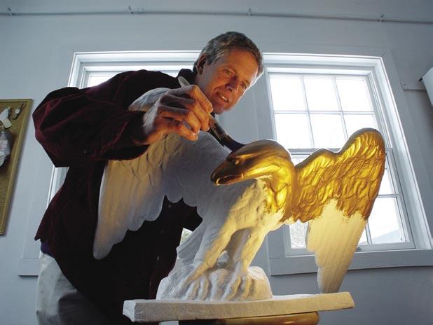 Contents CBMM exhibits technician Eric Applegarth readies the ornamental eagle for its perch atop Eagle House.