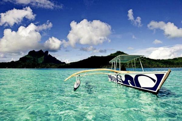 BORA BORA LAGOON CRUISE Group tour Half day or full day group tour on an outrigger boat with a local guide. Snorkeling in the coral garden and stops for Sharks & rays feeding.