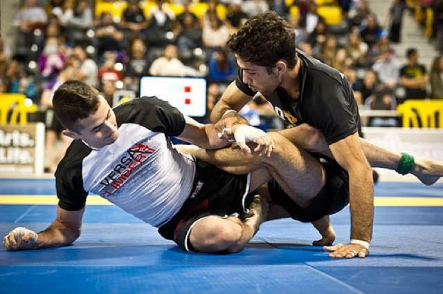 Picture 4. Ongoing no-gi Brazilian jiu-jitsu match (Graciemag 2012) In 1999, the Abu Dhabi Combat Club, known as ADCC, began to organize submission wrestling world championships.