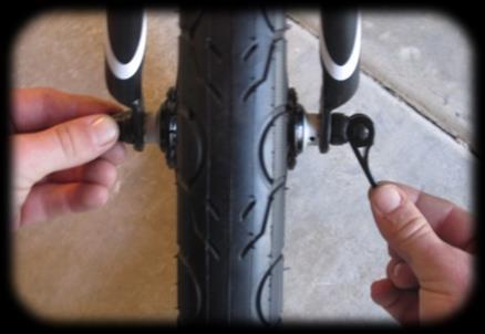 Open the quick release lever on front wheel. 4. Insert wheel into fork drops.