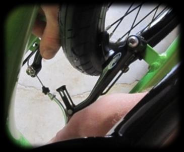 Rear Wheel Removal To remove the rear wheel, follow these steps: 1. Place the bike on the kickstand. 2.