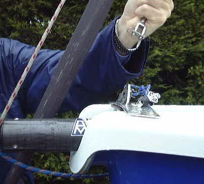 Attach the ring to the pin and then release the winch. DO NOT OVERWIND THE WINCH.