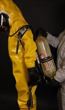 Have your assistant help you remove the SCBA backpack without disconnecting the regulator from