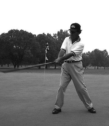 Check to see if your arms are relaxed and folded around your body as a natural response to the swing force.
