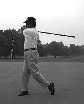 Relative to this, your left arm should be bent in the shape of the letter L. 5. Check to see if your wrists have hinged naturally, in response to the swinging motion. 6.