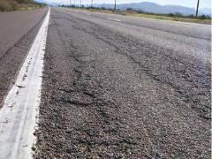 ROADWAY FEATURES SURVEY Item 4, Percent Asphalt Surface with Raveling: Estimate the percent area of all