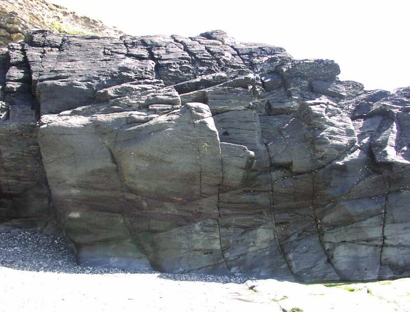 Godrevy : The Cave area 77 81 80 78 79 76 81 80 78&79 77 76 76 5c The blunt edge on often wet holds 77 5b The wet crack and dyno for a ledge surmount this to finish easily ** 78 6c Fingery and