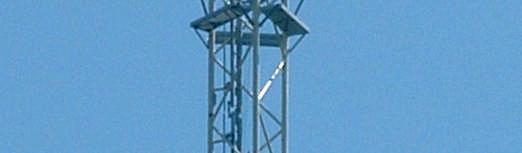 The boxes lower in the mast contain the signal connection and
