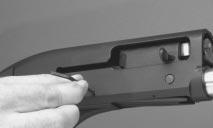 Push out the trigger guard pins. Be careful not to mar or scratch the receiver. FIGURE 16 FIGURE 17 Pull the pins completely free from the receiver with your fingers.