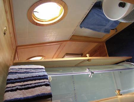 Avoiding a symmetrical window layout makes the interior layout more lexible: after all, you can t see both sides of the boat at once!
