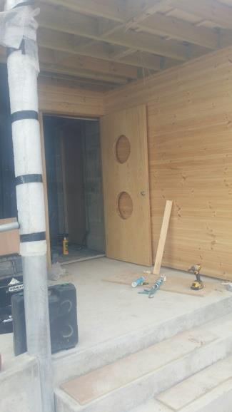The roof and cladding are now complete with the internal and external door frames and doors fixed with floor screed laid ready for the vinyl floor covering to be fitted just before Easter.